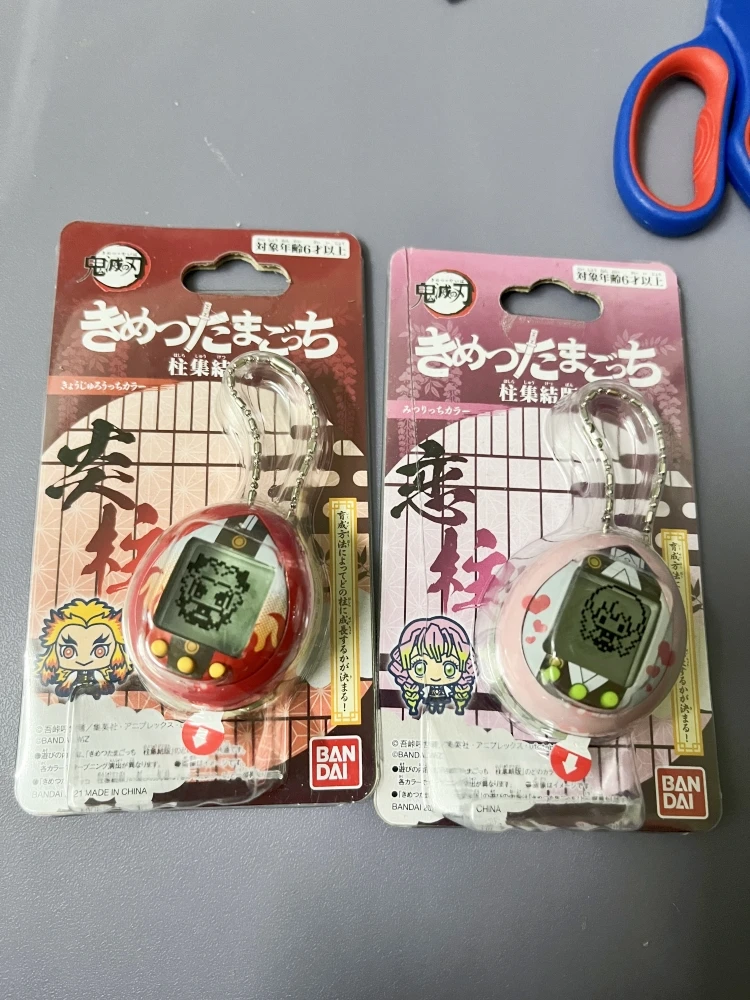 Demon Slayer mascotas electrónicas originales, Tamagotchi, Kisatsutaitchi, Kimetsu No Yaiba, figura de mascotas virtuales, juguetes coleccionables, regalos para niños