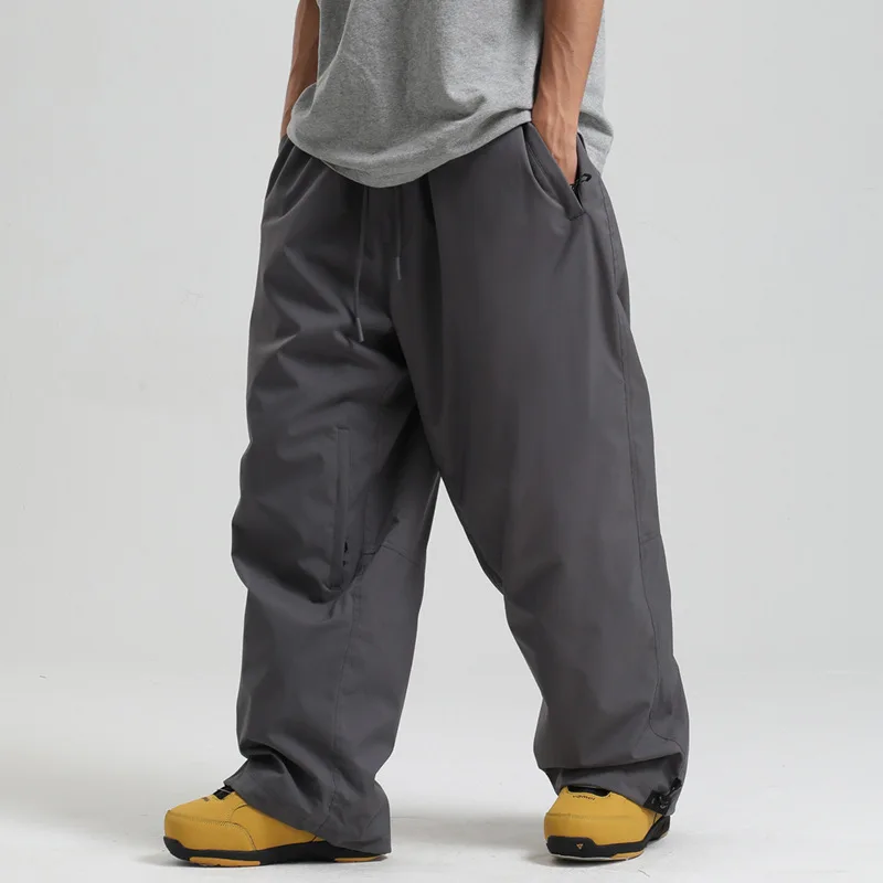 2025 nuovi uomini antivento solidi pantaloni da sci da donna impermeabili larghi larghi con cappuccio sci strides sport all'aria aperta pantaloni traspiranti per adulti