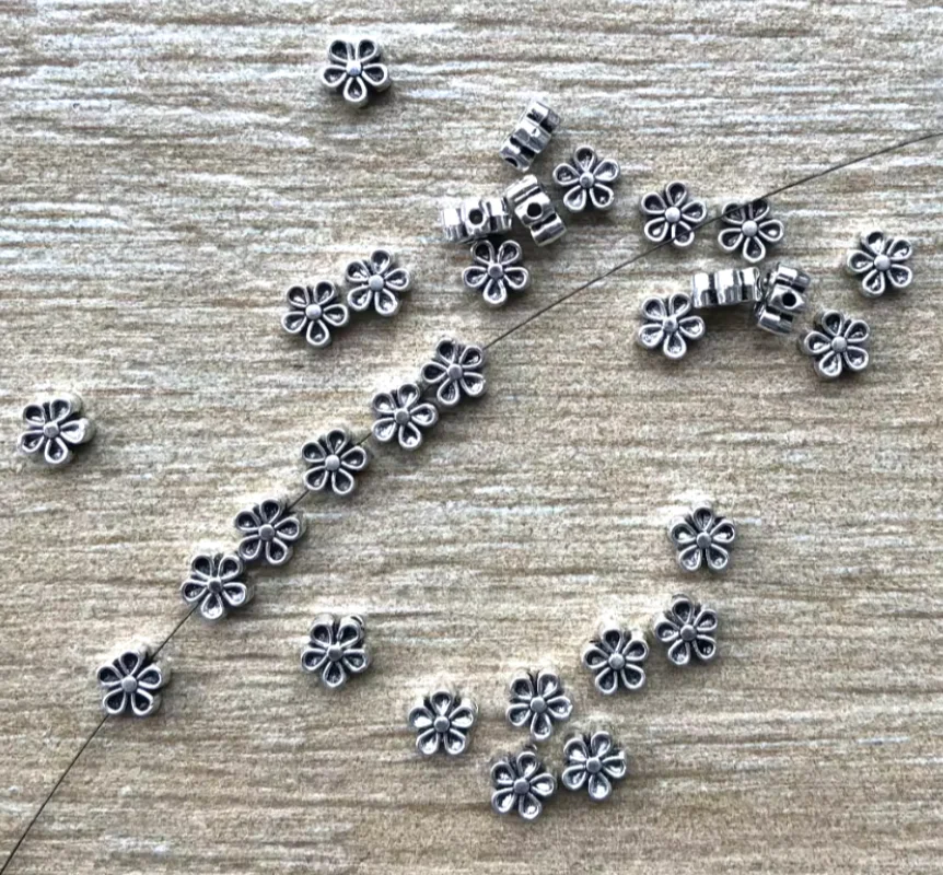 

50pcs 7*3mm Alloy metal tibetan silver flower spacer beads for jewelry making HW2619