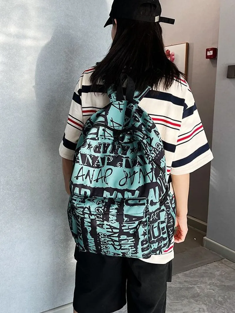 

Fashionable and personalized graffiti schoolbag for middle school students' backpack ins trend casual campus style knapsack