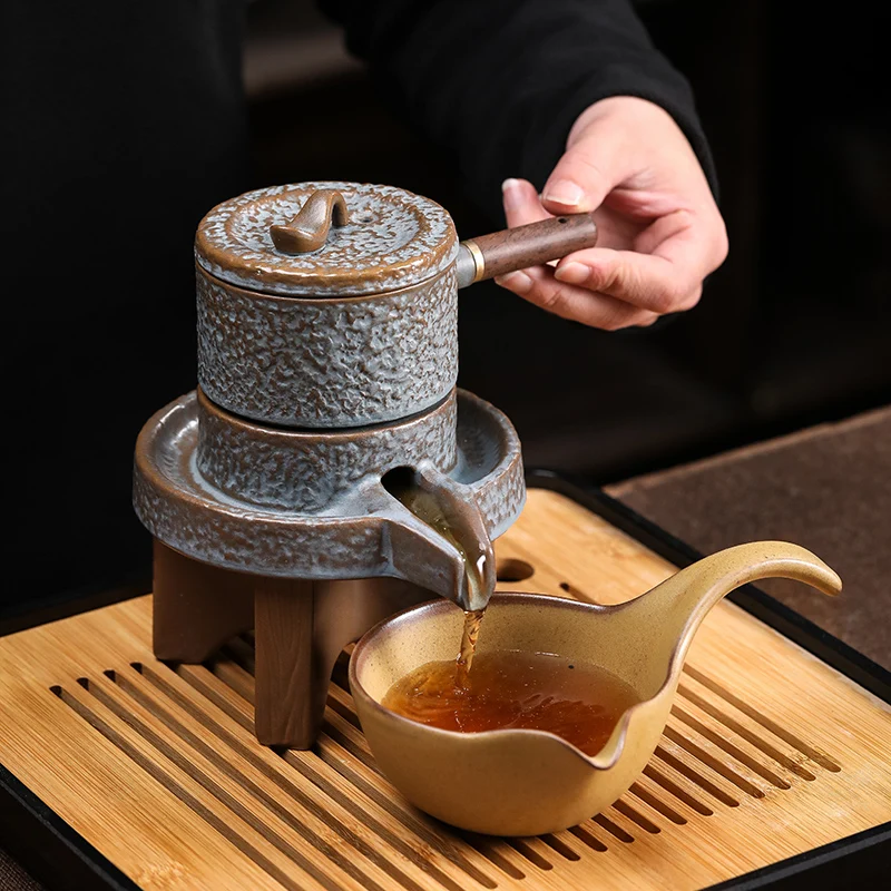 Lazy stone grinding tea set, single rotation out of the water Kung Fu teapot retro to run automatic tea brewing tea maker