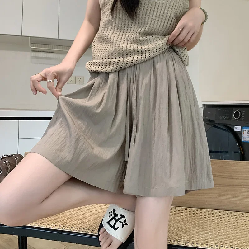 Moda coreana calças sólidas verão solto emagrecimento casual cinco quartos calças simples cintura alta drapeado plissado calças de perna larga