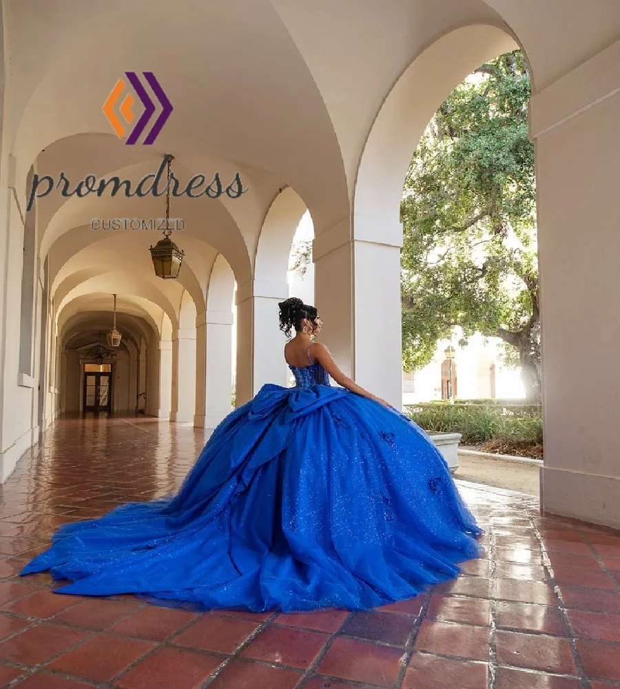 Glamourowna, królewska niebieska suknia Quinceañera z kwiatami, seksowne ramiączka spaghetti, błyszczące Vestidos De 15 Quinceañera na przyjęcie, szyta na miarę.