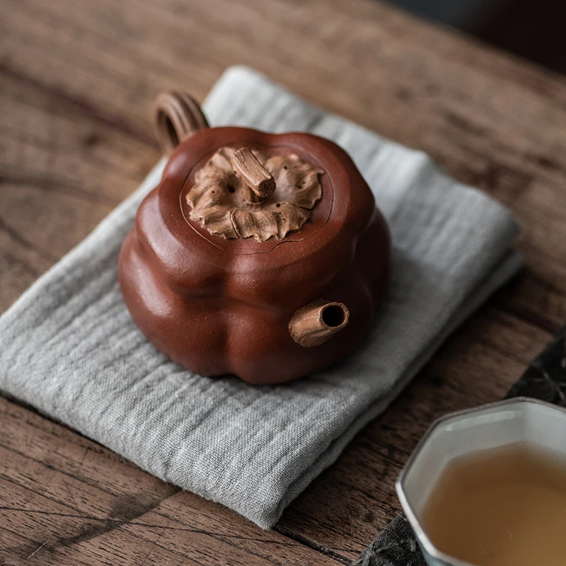 

Handmade Yixing purple clay pot tea set, bionic persimmon pot, Duan mud powder Zhu mud, a persimmon is safe, persimmon is ruyi