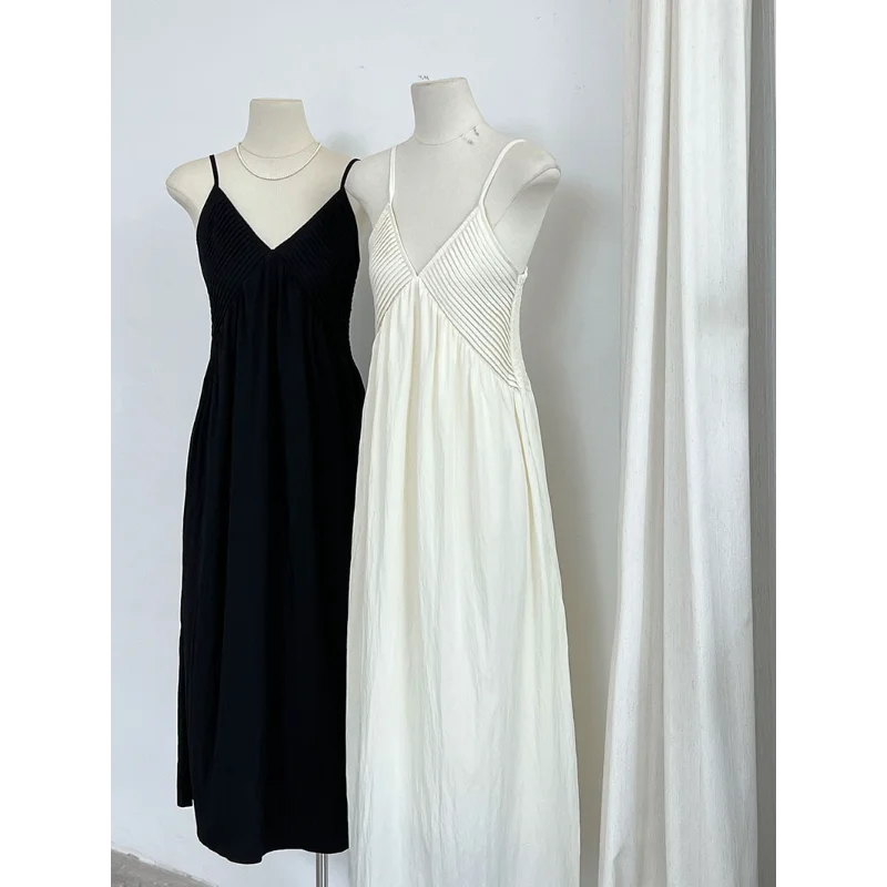 Abito da donna stile vacanza al mare con scollo a V francese Abito da donna senza maniche semplice ed elegante nero bianco sexy per festa di nozze