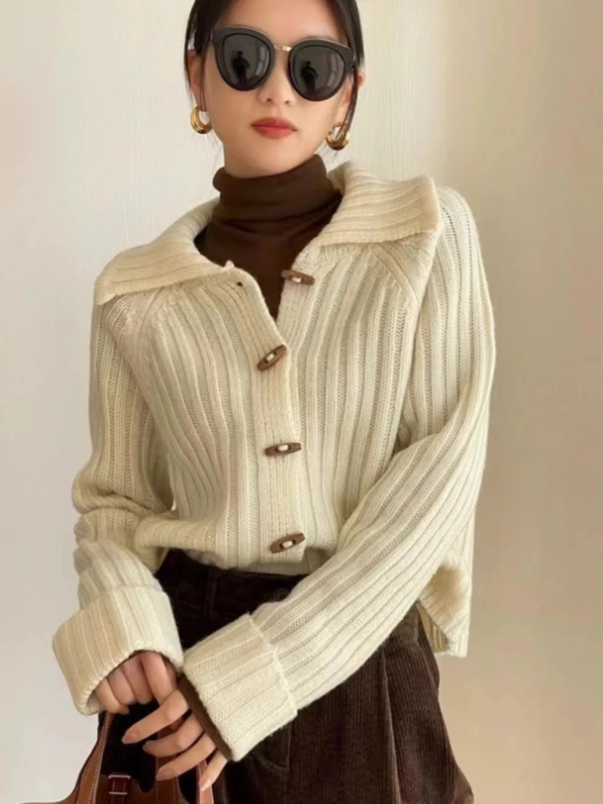 A sense of design! Fashion lapel 100 pure cashmere knitted cardigan women's autumn/winter Korean wool long-sleeved loose sweater