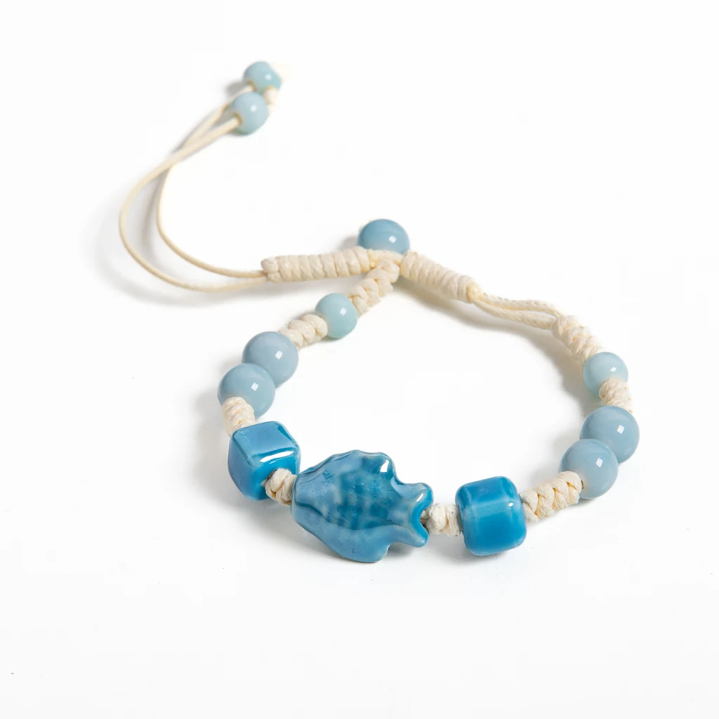 Pulsera hecha a mano con cuentas de pez de cerámica azul, cuerda ajustable, joyería fresca de estilo bohemio del océano para mujer S03-121