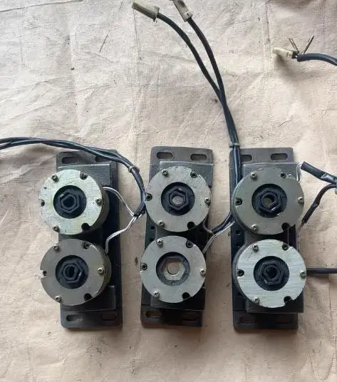 Electromagnetic brake MCNB 15-26. Removed from servo motor