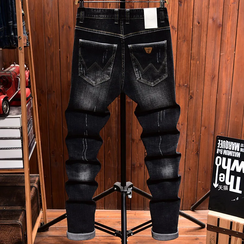 Jeans da strada alla moda in stile coreano da uomo, pantaloni lunghi retrò a tubo dritto in denim elastico a gamba piccola slim fit