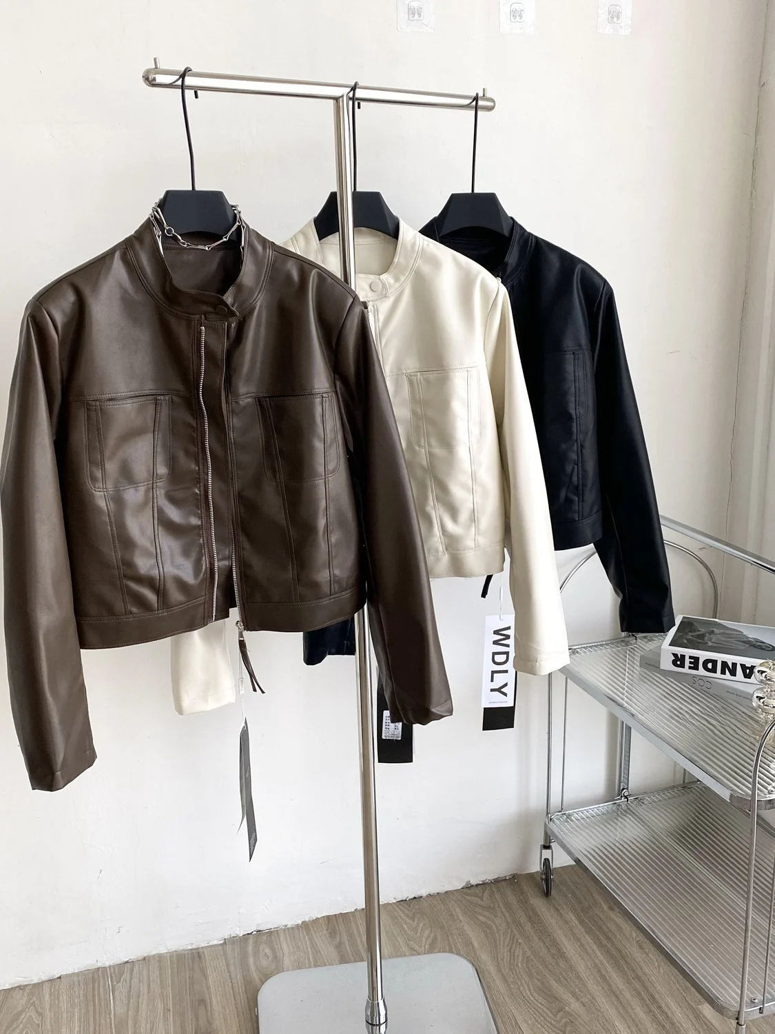Faionable polyvalent en cuir PU Jaet femmes ort ample décontracté col montant ceinturé automne vêtements d'extérieur haut pour femme