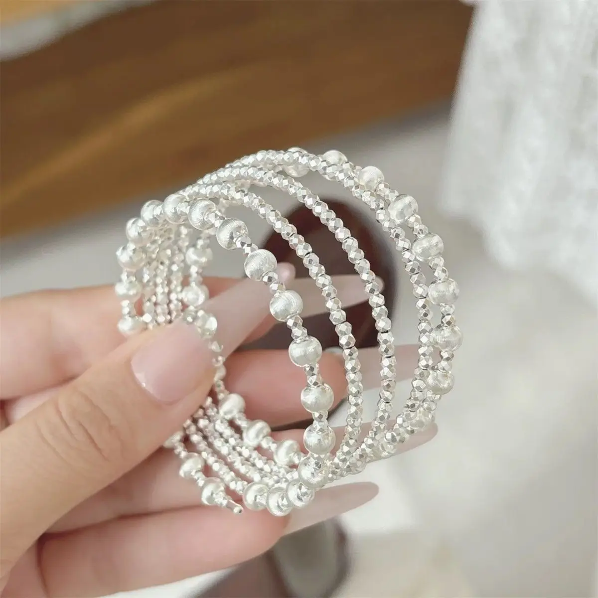 S999 sterling silver multi-layer broken silver round beads wrapped bracelet, irregularly layered and elastic string beads