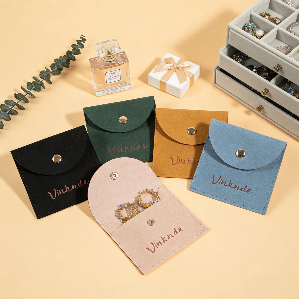 

100 шт. оптом, на заказ, портативные замшевые подарочные мешочки для ювелирных изделий с кнопкой, упаковочные пакеты для хранения ожерелий, серег, колец