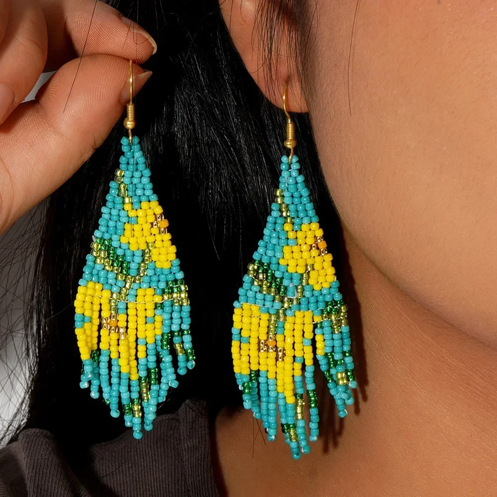 

Серьги из бисера с кисточками и цветами, дизайн, оригинальность, ручное вязание, богемный сплав, женские простые серьги из рисовых бусин