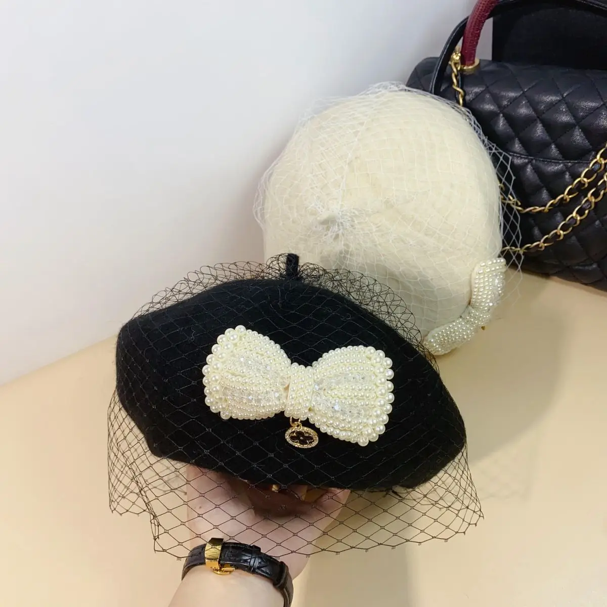 Autumn and winter warm wool elegant temperament painter hat French small fragrance retro mesh pearl bow party beret women