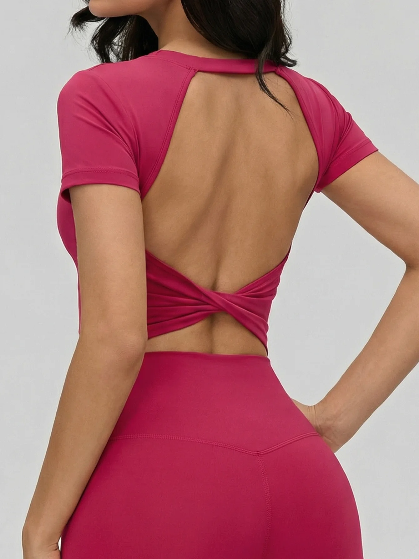2026 Summer Women's open-back yoga fitness T-shirt, sexy backless design with chest pads, slim waist workout top.