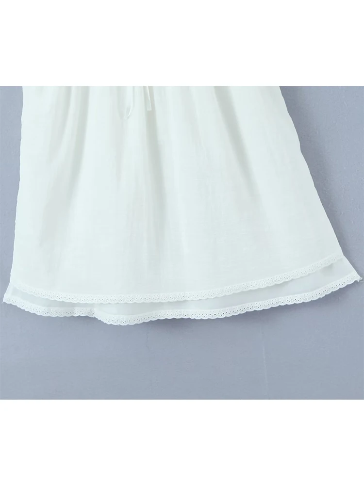 YENKYE – Mini Robe blanche brodée pour femmes, avec nœud épissé, Sexy, sans manches, avec laçage au dos, pour les fêtes de fin d'année, collection été 2023