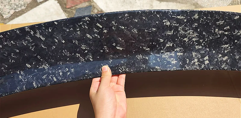 Forged carbon high gloss finish