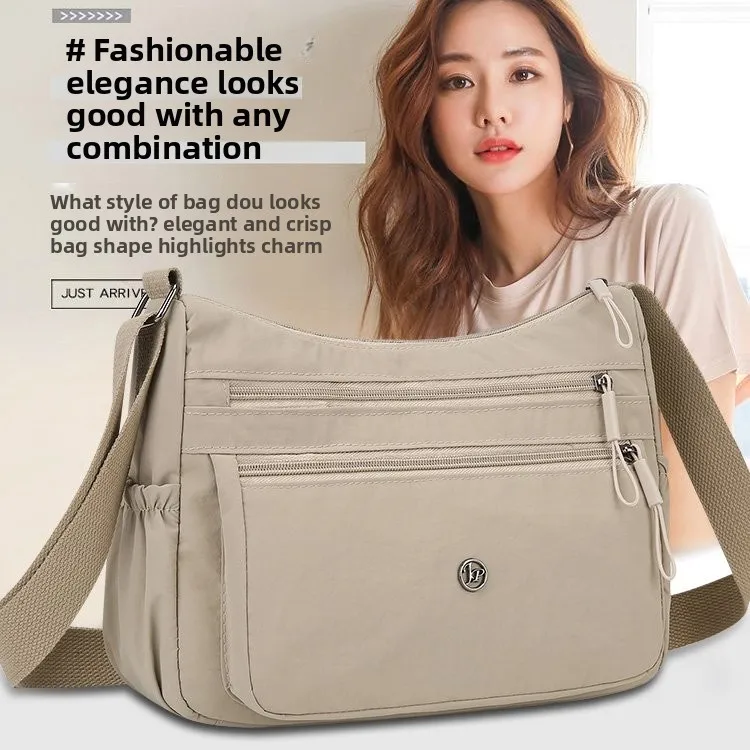 

Новая многослойная сумка-кроссбоди 2025 года на одно плечо, повседневная, универсальная, с множеством карманов, портативная, тканевая, водонепроницаемая, легкая, компактная.