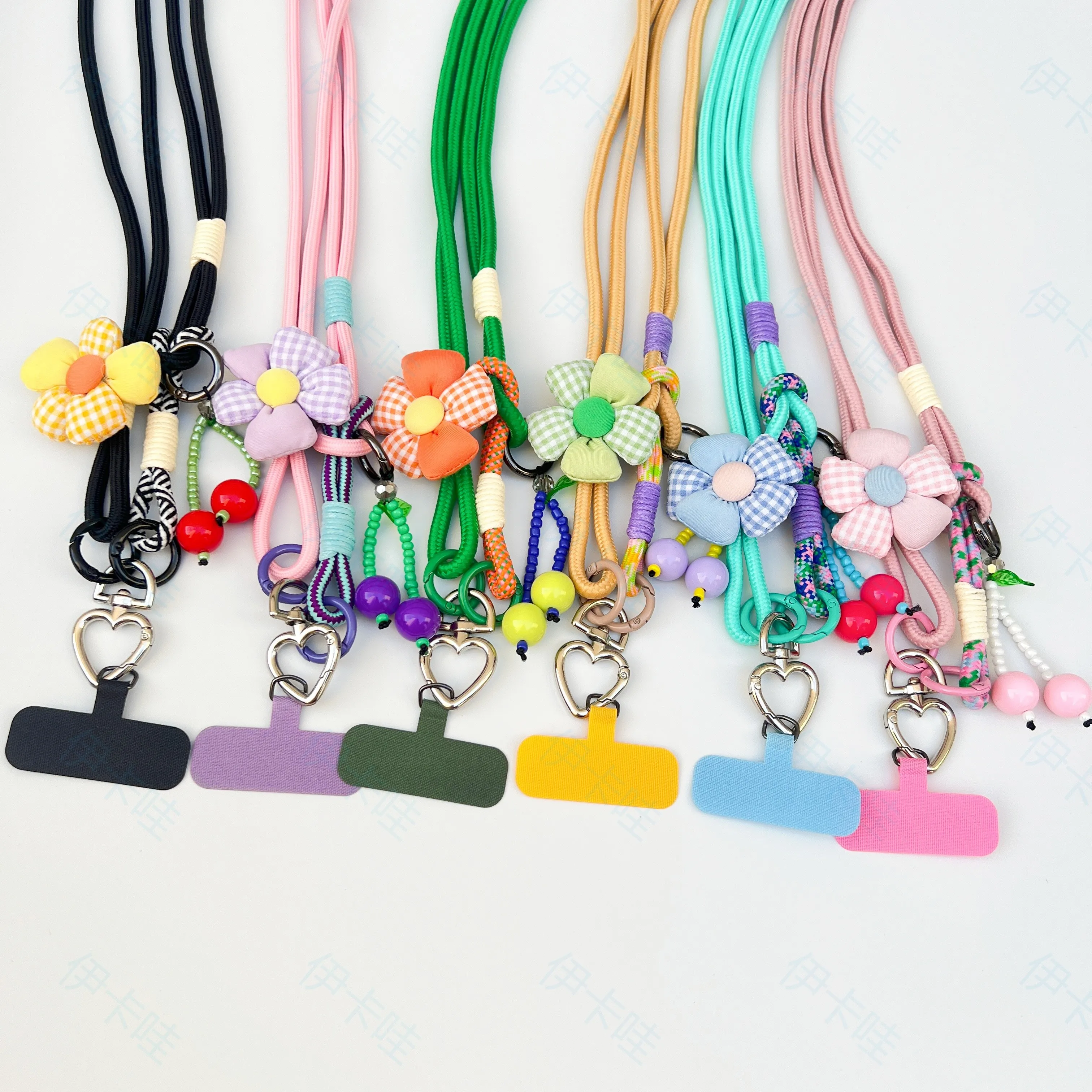 Cordão multifuncional dois em um para celular com uma longa corda inclinada e pingente de flor em forma de coração giratório