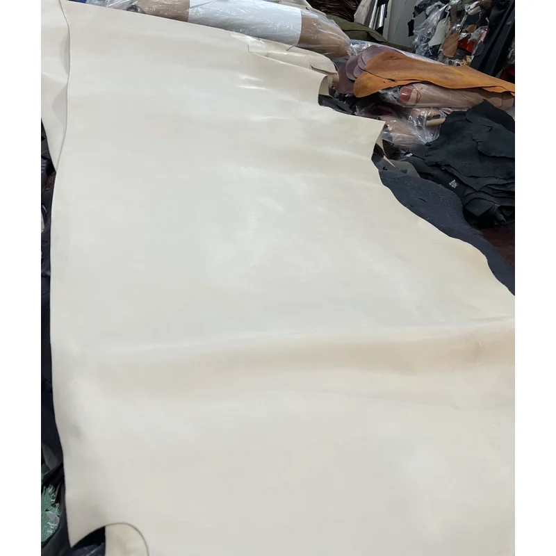 Leather embryo,  Granular surface absorbs water,  Italian apricot-colored top-grain leather Colored cowhide 1.4mm 22-24 SF