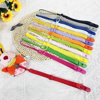 Klipsy do smoczków dla niemowląt jednokolorowe zabawki ząbkujące łańcuszek zapobiegający upadkowi lina taśma gryzaki smoczek uchwyt na sutki klips łańcuszki regulowane