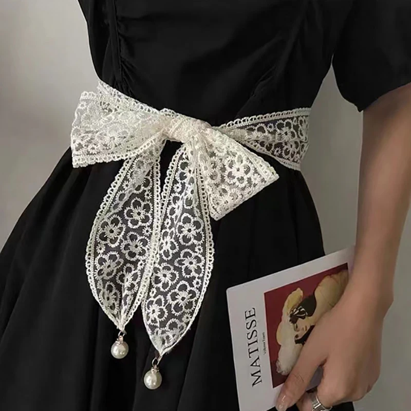 Nuevo cinturón de nudo de encaje de estilo coreano exquisito dulce con colgante de perla cinta larga bufanda falda chaqueta decoración cadena de cintura