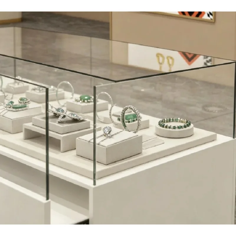 custom.Modern Minimalist White Glass Jewelry Display Counter, Lockable Retail Showcase with Storage Drawers