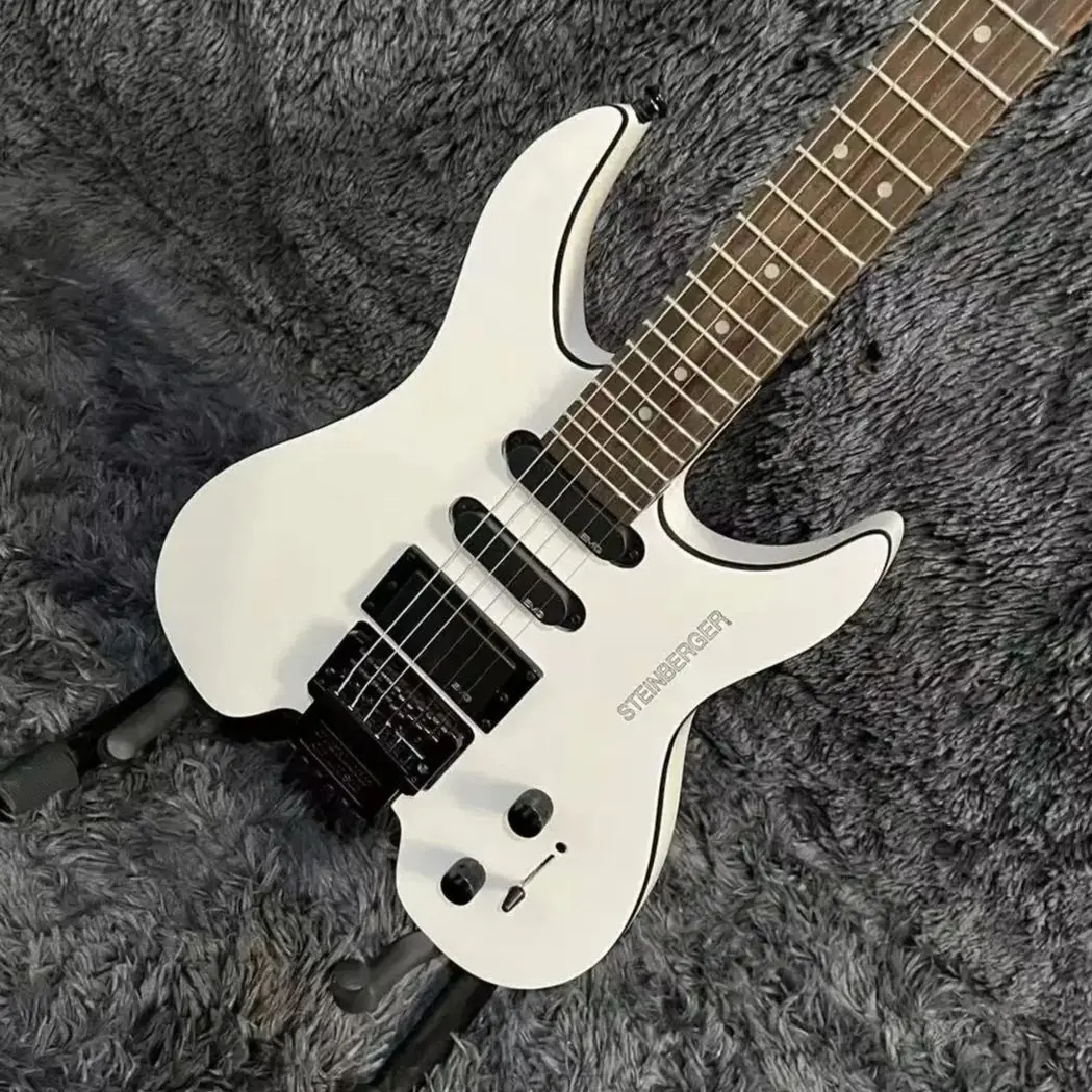 جيتار كهربائي من شتاينبرجر، جسم الماهوجني، لون أبيض، لوح فريتس من خشب الورد، جسر فلويد روز تريمولو، 6 أوتار، شحن مجاني