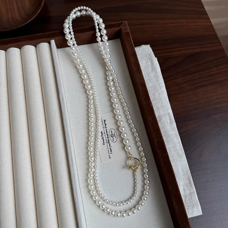 

Glass Pearl Gradient Long Sweater Chain Imitation Shijia Pearl Chain Multiple Ways to Wear Niche Temperament Online Influencer N