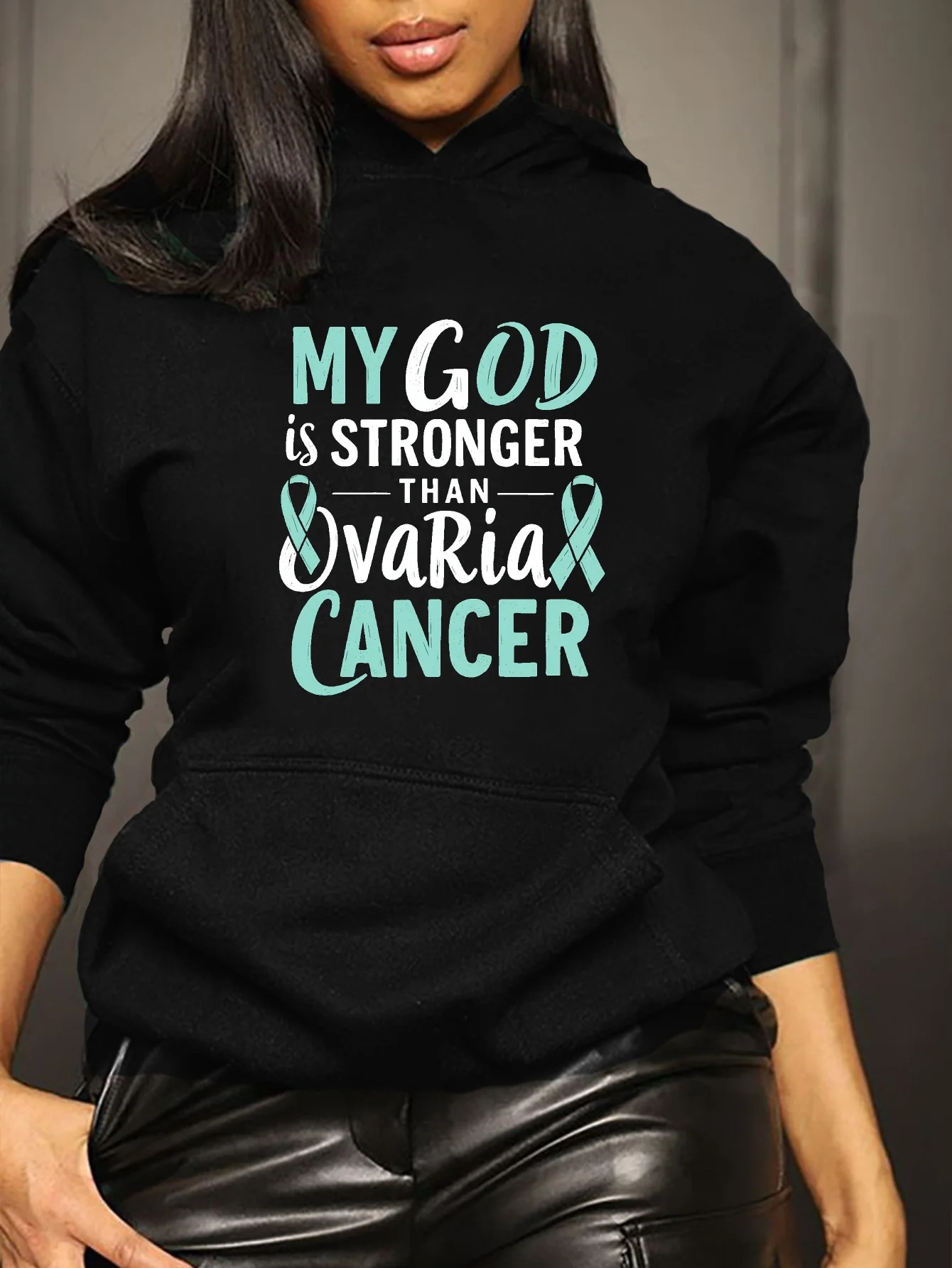 

"My God is Stronger Than Cancer" - An inspiring T-shirt with blue letters, suitable for cancer survivors and those with faith.