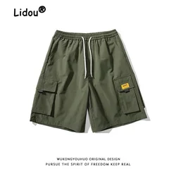 Maré de vários bolsos dos homens colando pano carga shorts nova cintura drawcord solto rua casual juventude cor sólida masculino curto