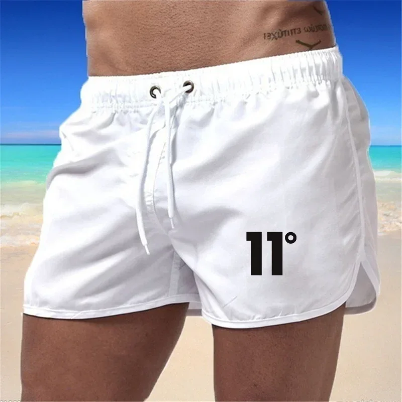 Bañador de secado rápido para hombre, pantalones cortos de playa, Color blanco y negro, talla 11, Color sólido, nueve colores, 2024