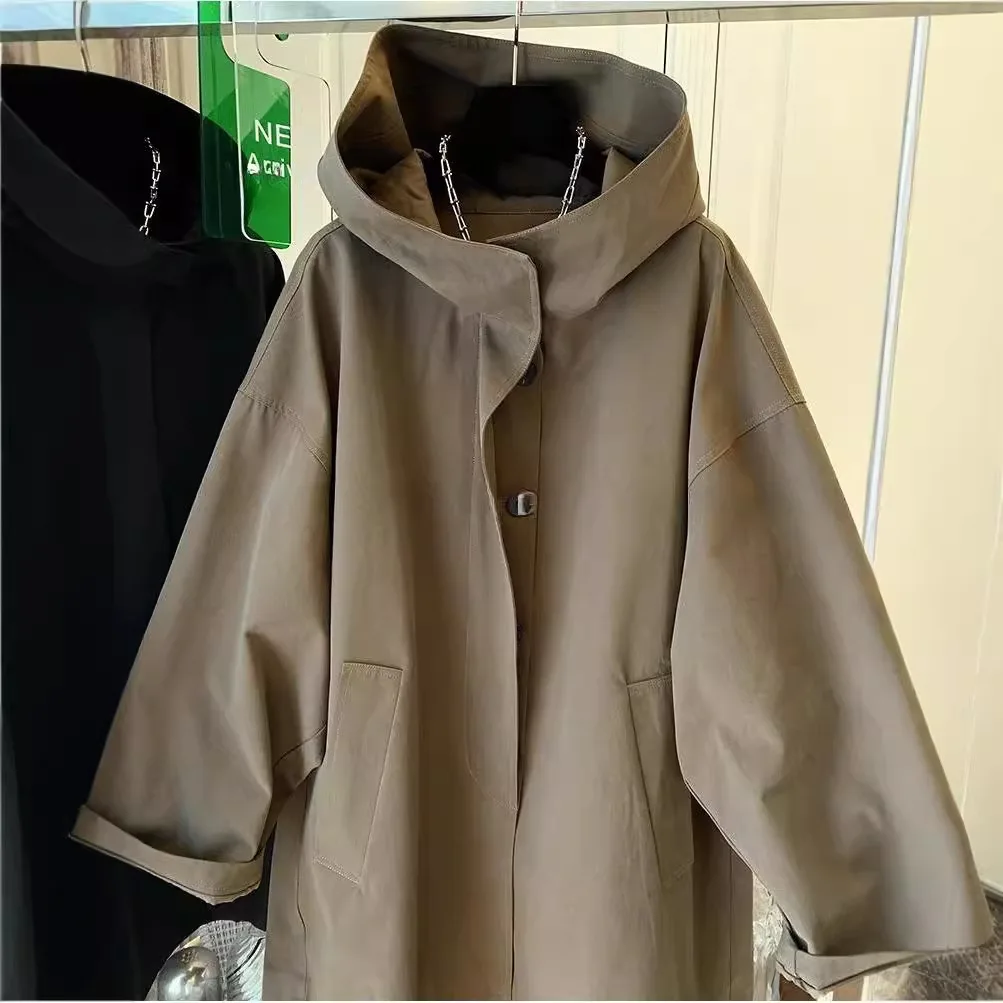 High-grade Maillard retro hooded windbreaker women\'s spring and autumn new plus size loose long fashion temperament brown coat.