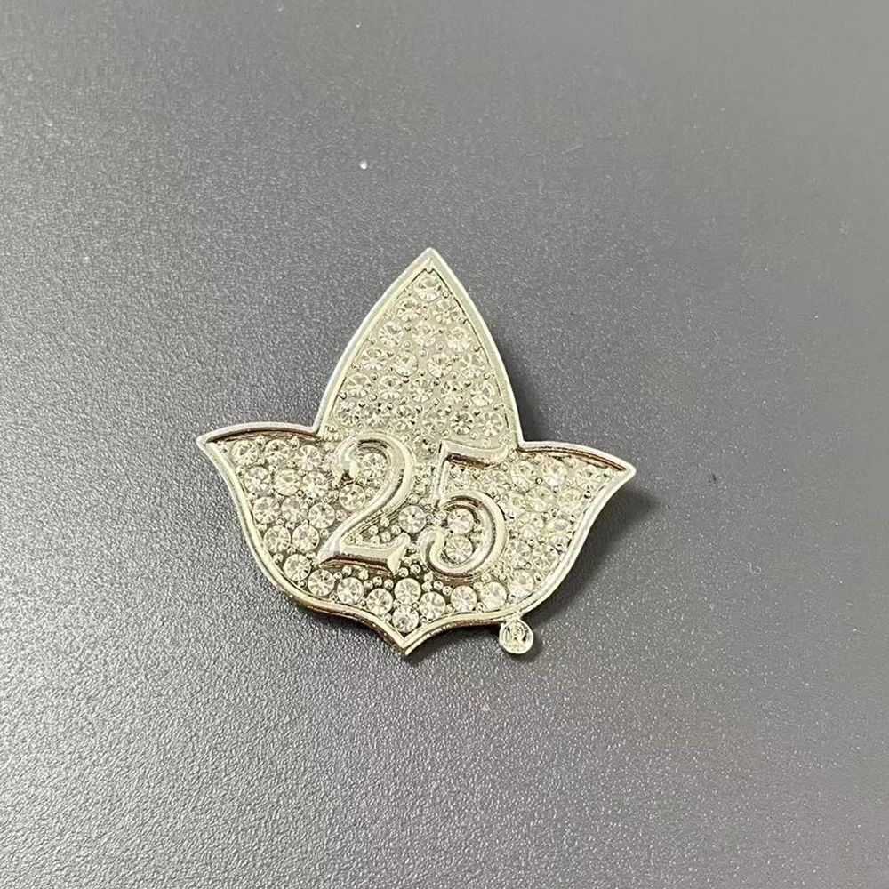 Commemorative Lapel Pins for the 25th and 50th Anniversaries of the Sorority Organization Activities