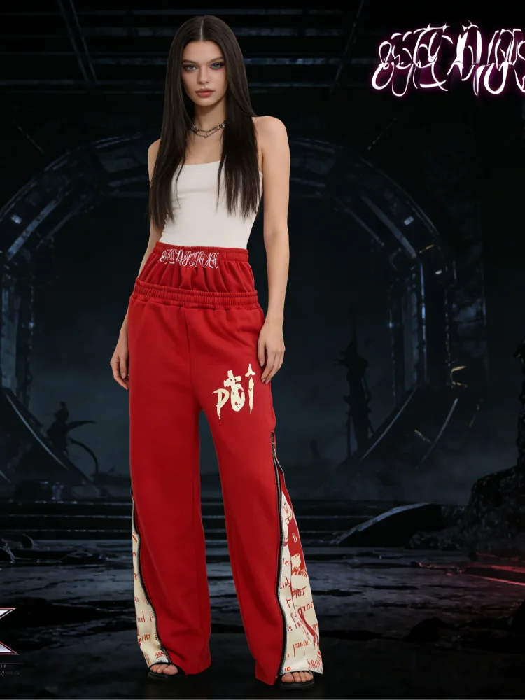 

Новый тренд в европейском и американском дизайне: свободные брюки в стиле хип-хоп с принтом на молнии, двойным поясом и темными цветами в ретро-стиле.