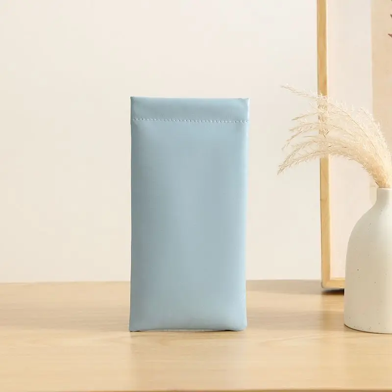 

Pressure - resistant portable women's sunglasses storage bag with automatic - closing spring - loaded protective cover