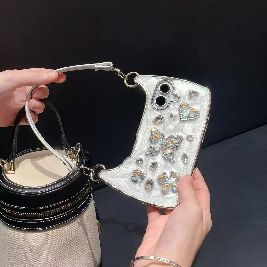 Custodia per telefono da polso con cinturino in pelle per borsa a forma di cuore con diamanti glitterati di lusso per iPhone 11 12 13 14 15 16 Pro Plus Max