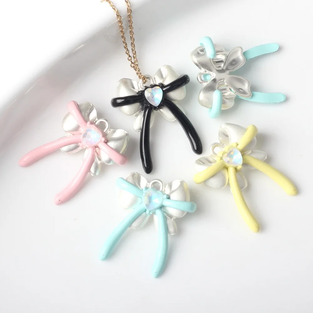 

Crystal Rhinestone Love Heart Rubber Enamel Alloy Oil Drop Ribbon Knot Tie Bow Jewelry Charms Necklace Pendants 19*23mm 20pcs