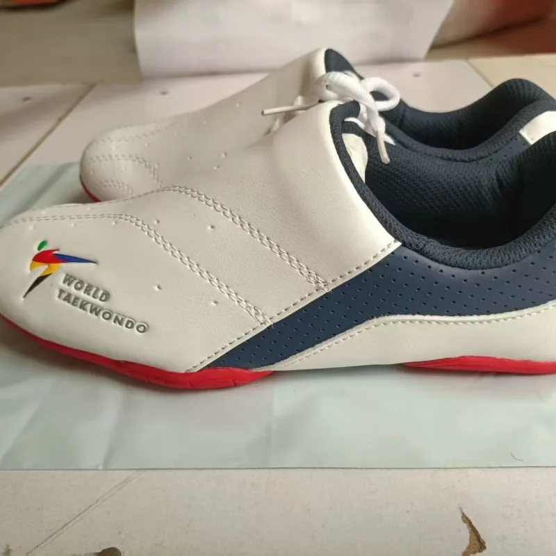 العلامة التجارية الأصلية المهنية التايكوندو حذاء التدريب مريح يمكن ارتداؤها فنون الدفاع عن النفس حذاء مصمم للجنسين حذاء التايكوندو