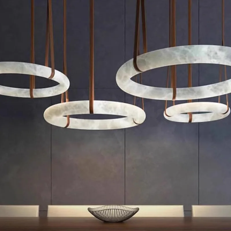 

AiPaiTe Spanish Marble leather belt Chandelier Copper rounded designer pendant light decoration for dining room shop showroom