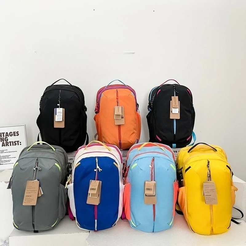 Nova mochila escolar popular unissex casual com cores contrastantes para atividades ao ar livre, mochila de grande capacidade.