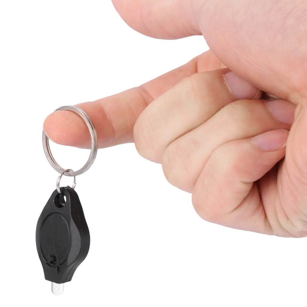 Mini portachiavi torcia portatile spremere LED luce Micro torcia campeggio esterno luce portachiavi di emergenza