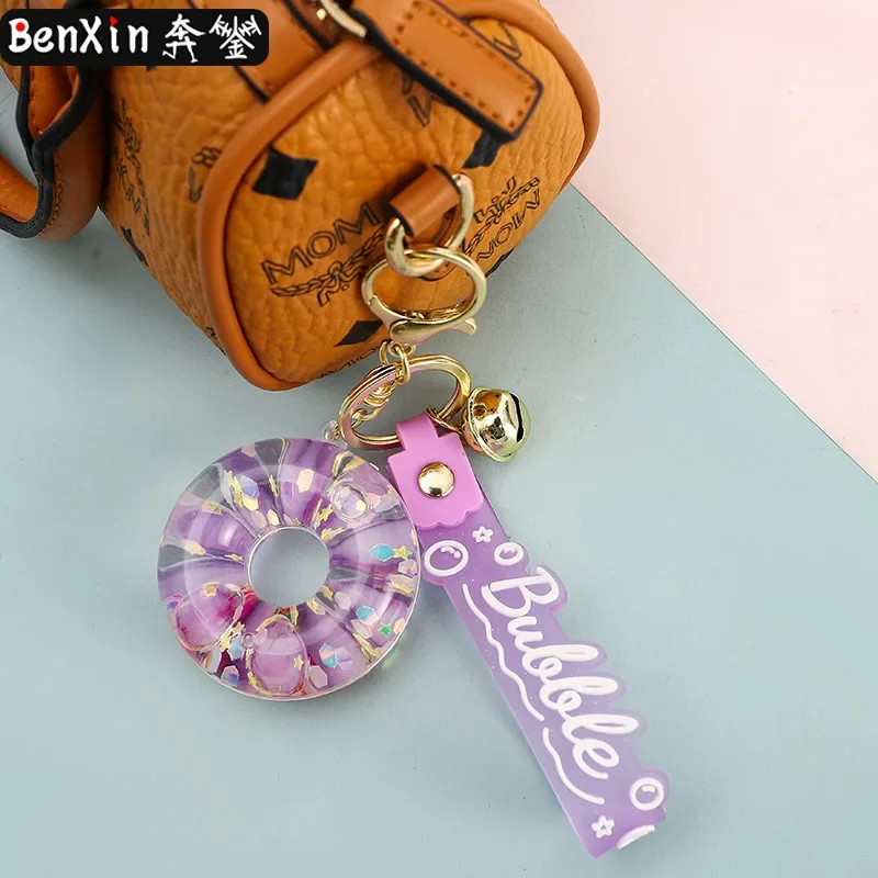 2025年ミンソオイルインオイル発光ドーナツキーホルダー、流砂カーペンダント、絶妙なバッグアクセサリー、クレーンゲーム景品