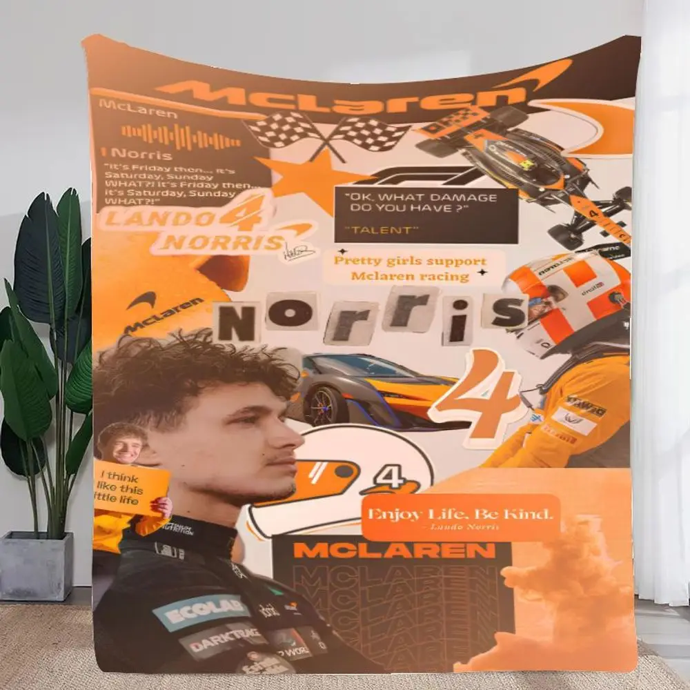 ランド・ノリス-マクラーレン-f1-レーシングブランケット-レースナンバー4、インスピレーションを与える引用文、そしてスタイリッシュな要素を備えた鮮やかなオレンジ色のコラージュデザイン
