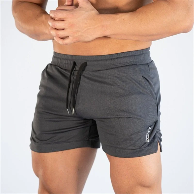 Pantalones cortos deportivos para hombre, Shorts de malla transpirable, secado rápido, ropa deportiva para gimnasio y playa, novedad de verano, 2024