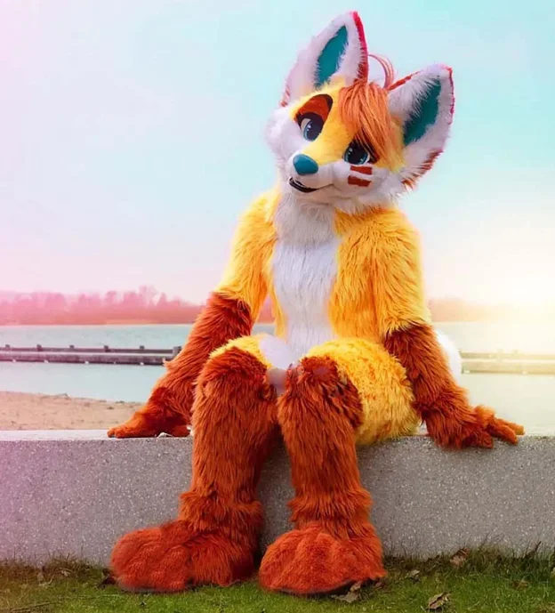 American fursuit Fox mascot costume Adult male and female cosplay in disguise for a large rave Halloween show