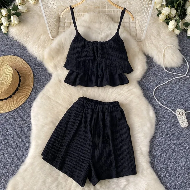 Moda nuove donne eleganti pantaloncini estivi vestito Vintage Sexy senza maniche canotte Top e pantaloni corti due pezzi Set abiti femminili