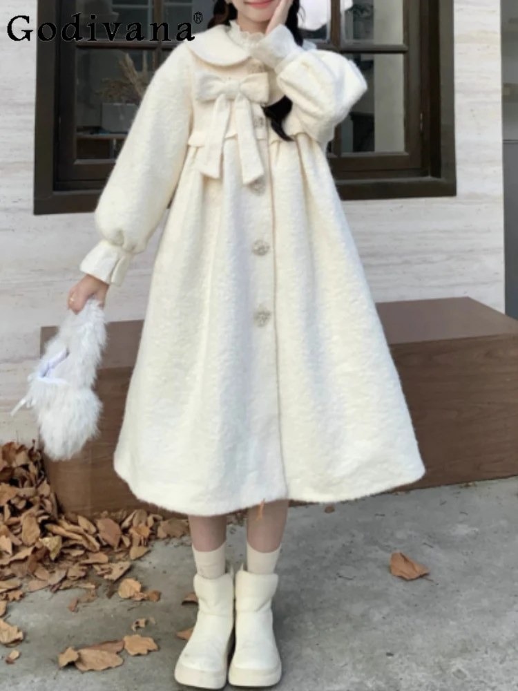 

Women's Winter New Sweet Peter Pan Collar White Long Sleeve Woolen Coat Loose Sweet Bow Versatile Age Reducing Lolita Coats