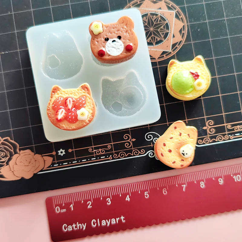 

Little Cute Strawberry Cat Bear Bunny Silicone Mold Pottery Clay Biscuit DIY molds