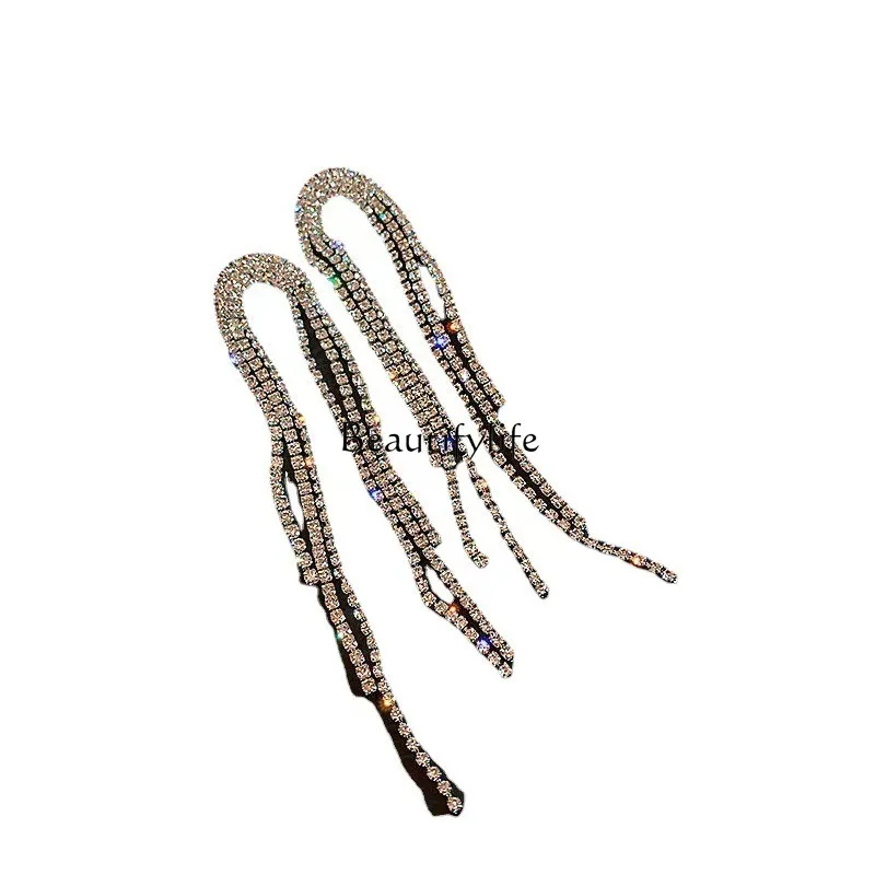 

Super flash long fringed earrings, irregular temperament, high-end earrings.